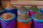 Colorful bags of spices for sale at the Medina Souk Marrakech-Morocco Art Print